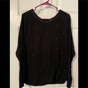 Black sweater. rhinestone embellishments on front.